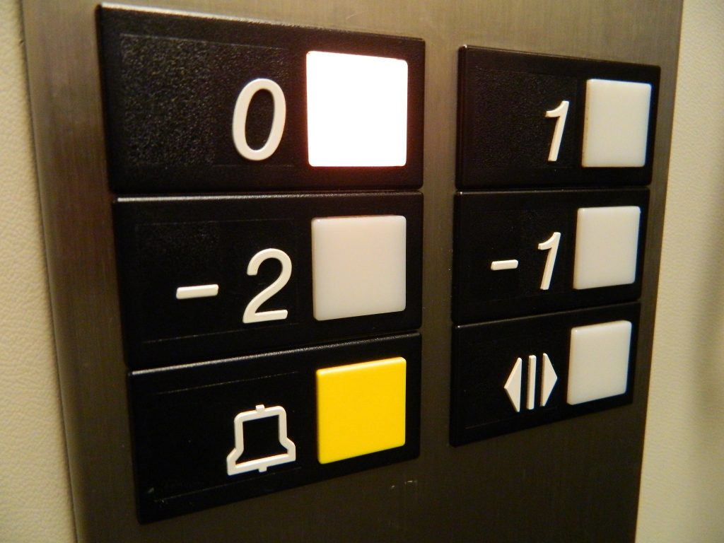 ground floor elevator button lit